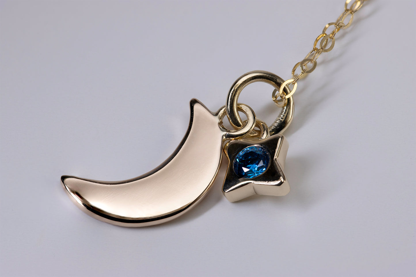 New Moon with Star Gem in Gold - Eamon ó Broin Jewellery